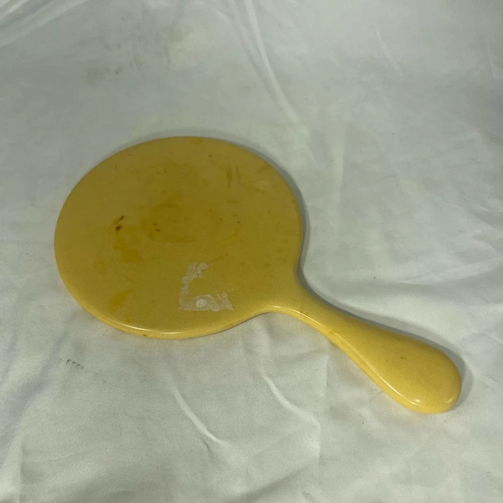 Vintage Bakelite hand held mirror